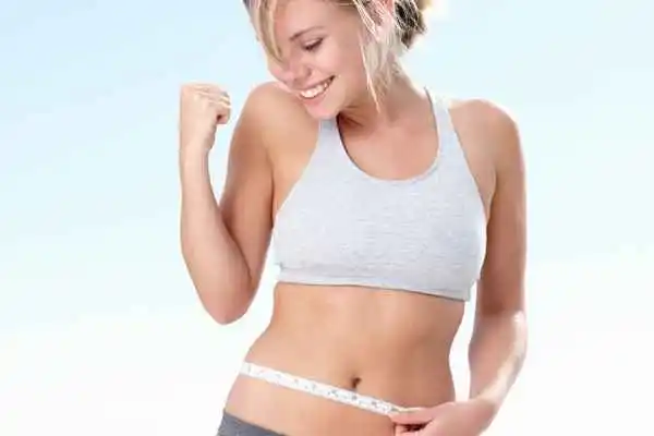 woman happy after fat reduction treatment Greater London (Westminster)